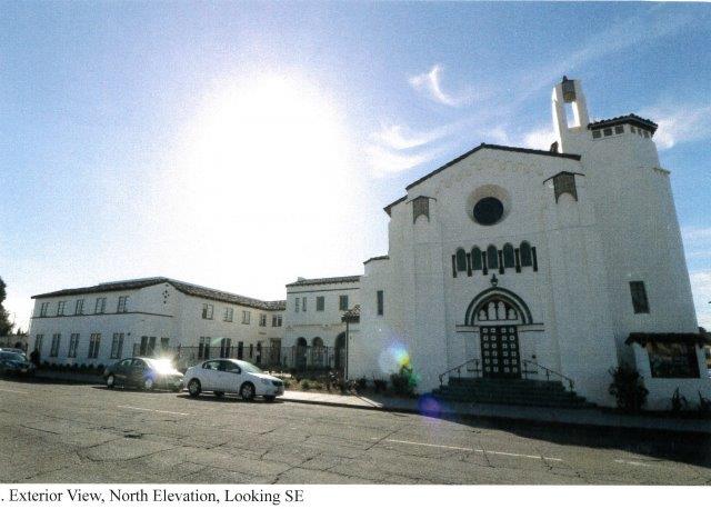 Completed overall front view of Melrose Baptist Church, the front gated landscaped courtyard, and the school, from right to left.